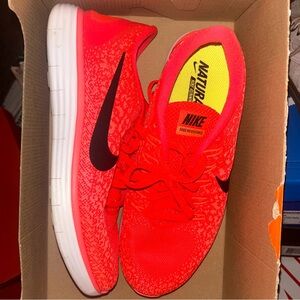 Pink and black Nike sneakers